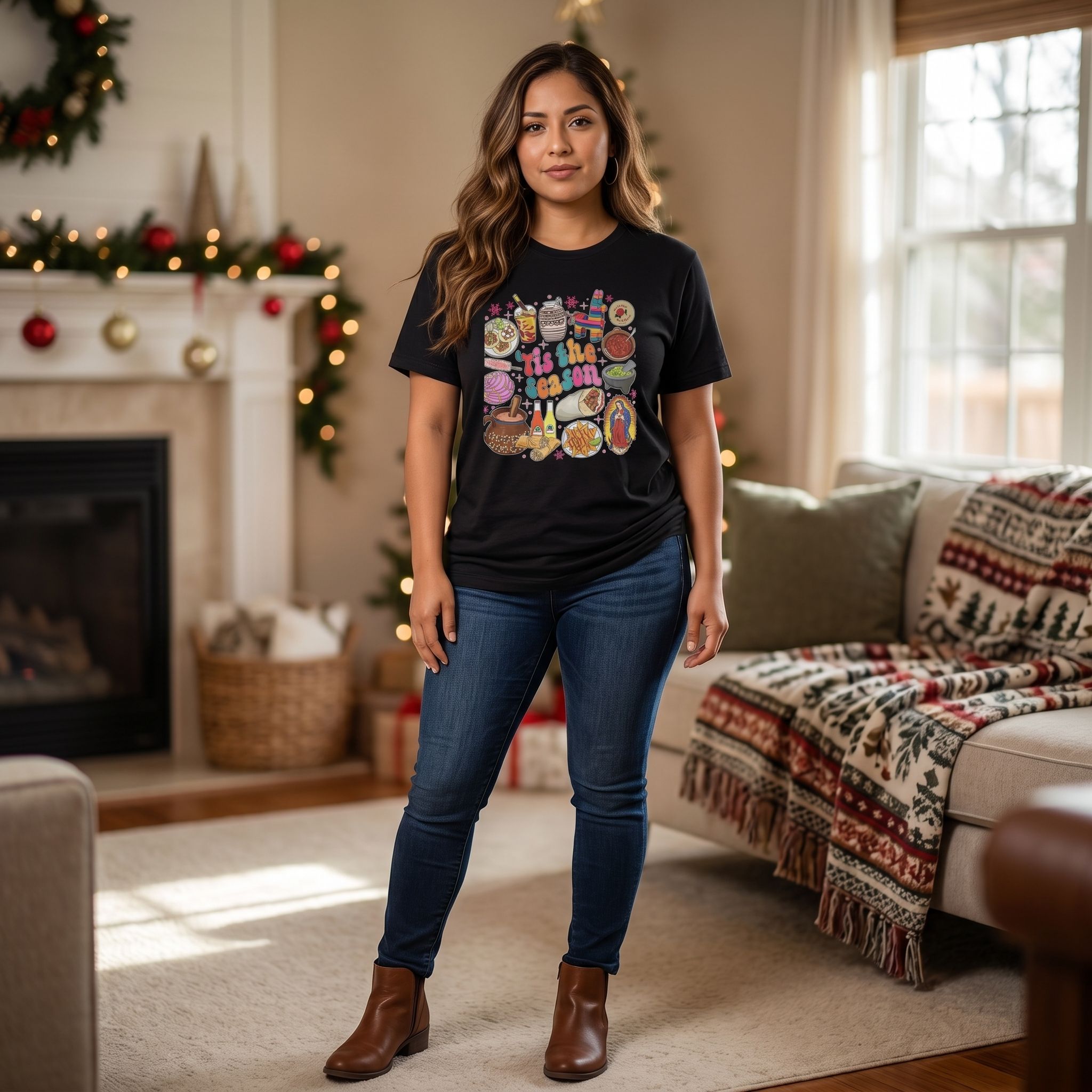 Model wearing 'Tis the Season' t-shirt in a warm indoor setting, showcasing fit, drape, and festive style.