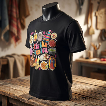 Side view of 'Tis the Season' t-shirt on a mannequin, emphasizing seams, shoulder taping, and fabric quality.